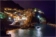 Manarola may be the oldest of the towns in the Cinque Terre, with the cornerstone of the church, San Lorenzo, dating from 1338. The local dialect is Manarolese, which is marginally different from the dialects in the nearby area. The name "Manarola" is probably a dialectical evolution of the Latin, "magna rota". In the Manarolese dialect this was changed to "magna roea" which means "large wheel", in reference to the mill wheel in the town.