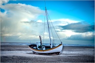 There are still a few places in Denmark where they pull the fishing boats up on the beach instea of using a barbour.